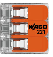 WAGO 221 electrical connector with orange and clear design on a white background