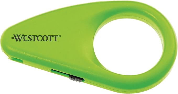 Westcott Mini Ceramic Safety Blade Box Opener in green, featuring a compact design with a ceramic blade. The opener is shown against a neutral background, highlighting its ergonomic shape and safety features for cutting PVC tape.