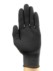 Retail packaging of Ansell HyFlex 11-840 gloves showing product details and branding