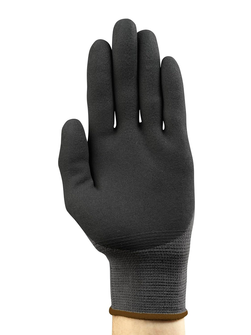 Retail packaging of Ansell HyFlex 11-840 gloves showing product details and branding