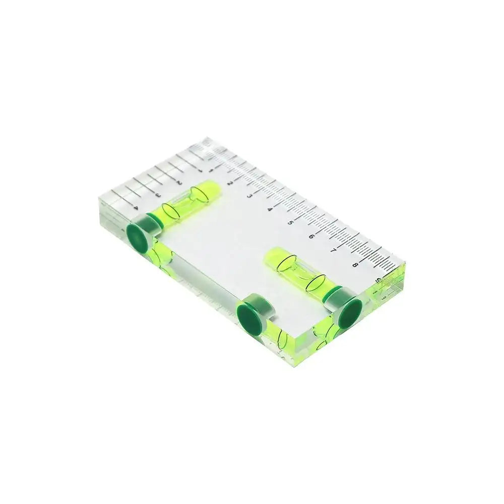Magnetic Mini Spirit Level attached to a moving light yoke during setup.