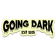 Sticker with 'GOING DARK EST 2025' text on a light yellow background