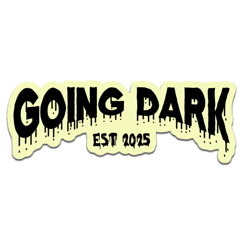 Sticker with 'GOING DARK EST 2025' text on a light yellow background